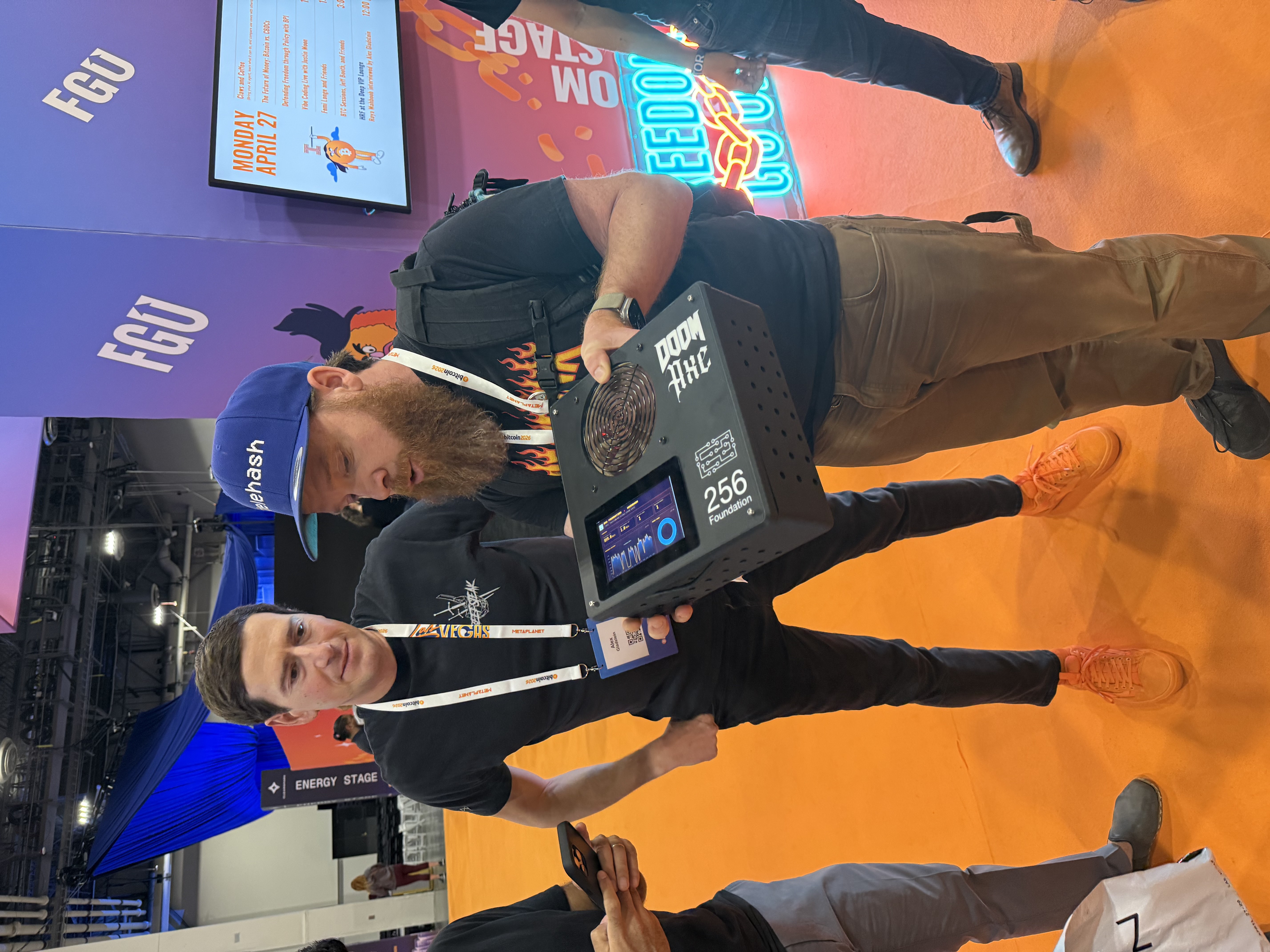 Schnitzel showing DOOMAXE on the conference floor at Bitcoin 2026